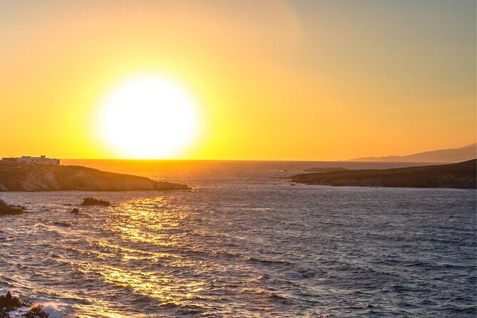 Mykonos Catamaran Sunset Cruise with Meal, Drinks & Transfer - Sailing past Psarou Beach