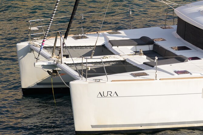 Mykonos Catamaran Sunset Cruise with Meal, Drinks & Transfer - Swimming and dinner near Super Paradise