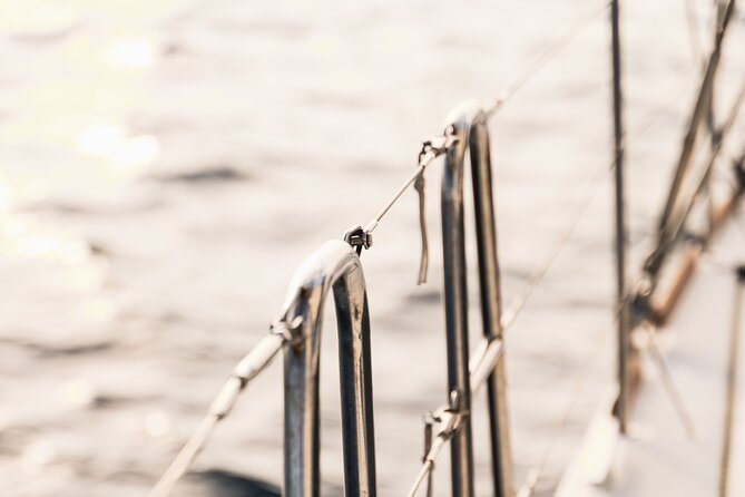 Mykonos Catamaran Sunset Cruise with Meal, Drinks & Transfer - The sunset from the Aegean