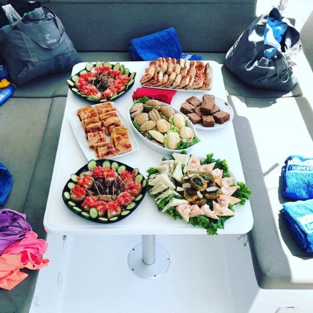 Mykonos: Full-Day Catamaran Cruise with Fresh Lunch - What your eight hours on the catamaran feel like
