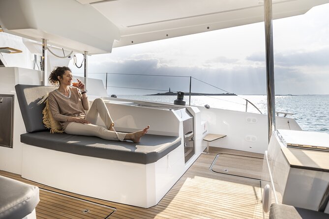 Mykonos: Luxury Catamaran Cruise with Meal, Drinks & Transport - A glimpse of Delos, not a shore visit