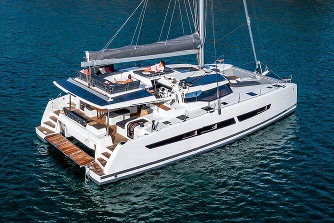 Mykonos: Luxury Catamaran Cruise with Meal, Drinks & Transport - Rhenia: the main swimming stop