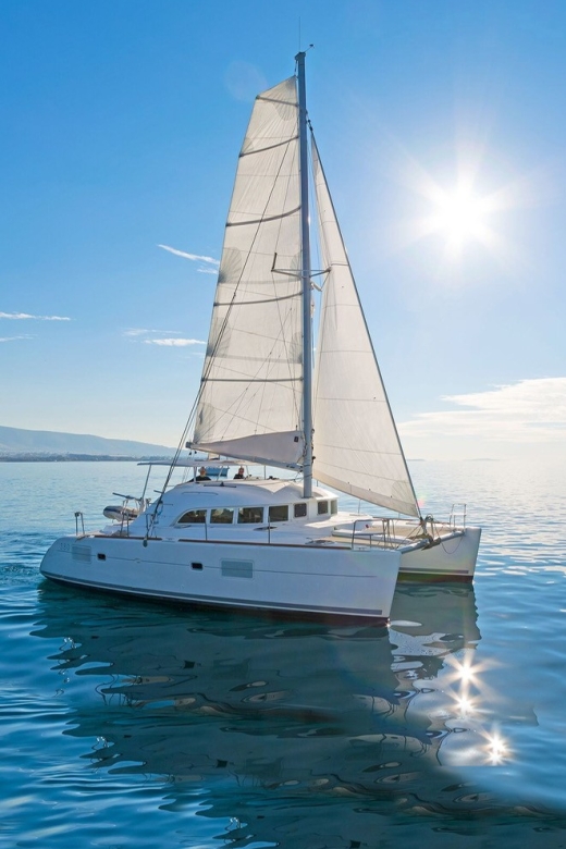 Mykonos: Private Catamaran Cruise w/ Food, Drinks & Transfer - Greek lunch served on board