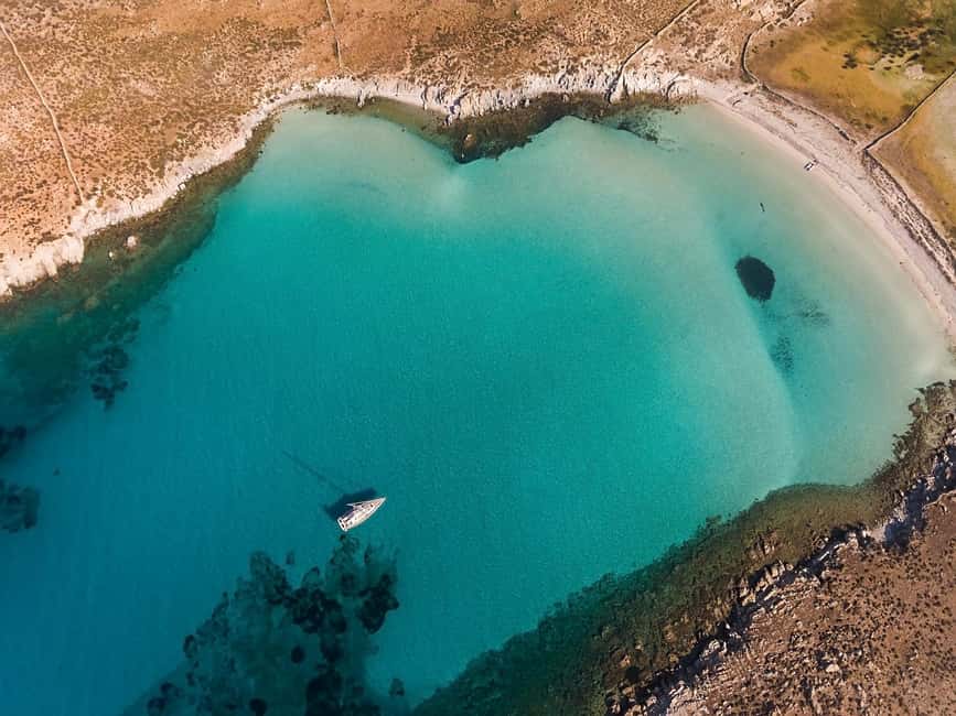 Mykonos: Rhenia Island Catamaran Cruise with Meal and Drinks - Music, drinks, and the social mood onboard