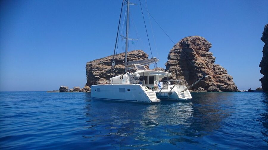 Naxos: Catamaran Cruise with Swim Stops, Food, and Drinks - Sailing away from Naxos for a day on the water