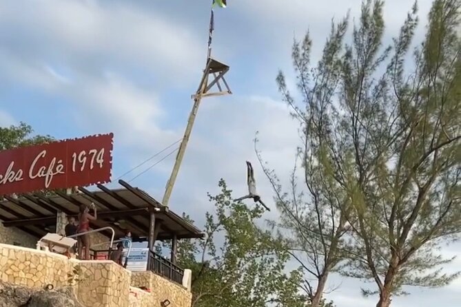 Negril 7 mile Beach, Party Catamaran Cruise , Snorkeling and Ricks Cafe Combo - Rick’s Cafe and the final sunset stop