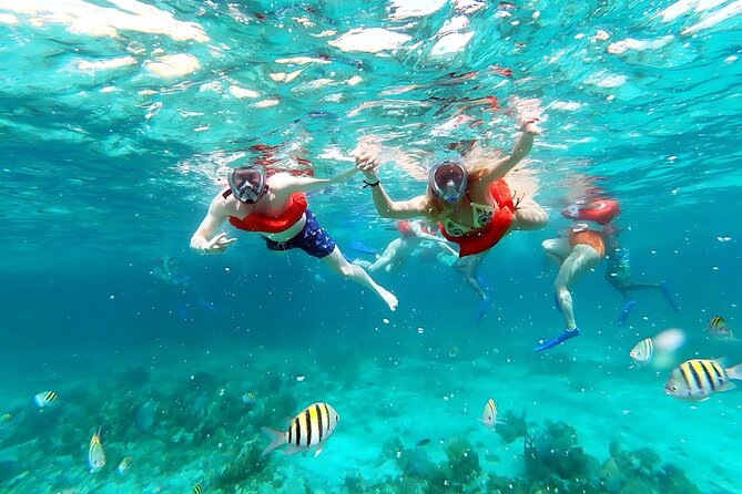 Negril Catamaran Morning Sail with Snorkeling & Pirate’s Cave - Drinks, Jamaican snacks, and the onboard rhythm