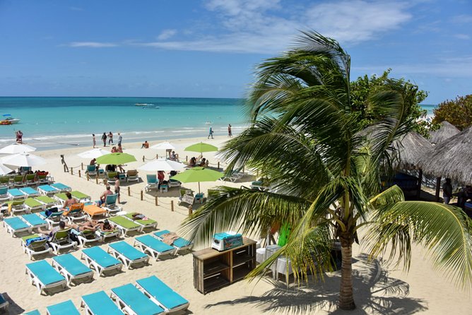 Negril Highlights Catamaran Cruise With Stop At Margaritaville - Setting out beside Seven Mile Beach