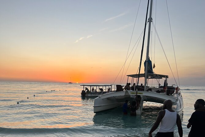 Negril Private Day Tour: ATV Ride, Party Catamaran & Ricks Cafe - Rick’s Cafe for sunset and cliff jumps