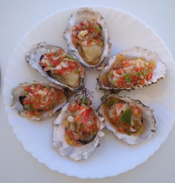 O Grove: Ría de Arousa Catamaran Tour with Seafood Lunch - What $46 gets you
