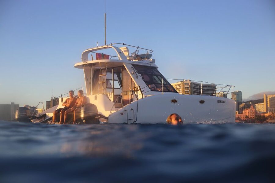 Oahu: Private Catamaran Sunset Cruise & Optional Snorkeling - Sunset from the water, with your own soundtrack