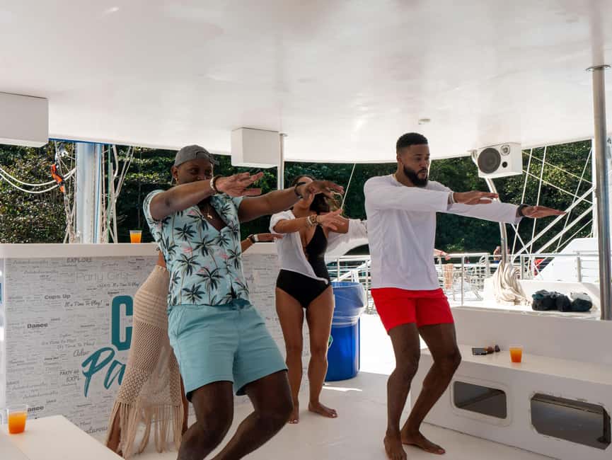 Ocho Rios: Catamaran Sail & Snorkel + Dunn's River Climb - Snorkeling in clear water, with realistic expectations