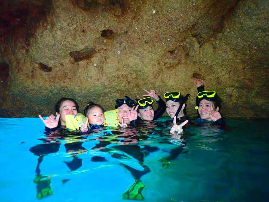 Onna: Blue Cave Snorkeling from Catamaran - Meeting the staff at Ryukyu Mura