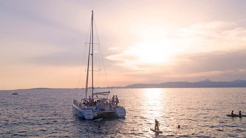 Palma de Mallorca: Deluxe Catamaran Sailing Tour with Meal - Swimming beneath the Cap Rocat cliffs