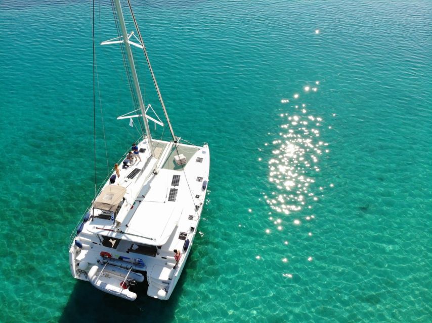 Paros: Private Catamaran Cruise with Lunch, Drinks & SUP - Greek lunch, fruit, and drinks onboard