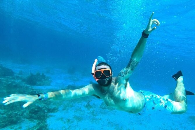 Party Catamaran Cruise with Open Bar and Snorkeling Montego Bay - Montego Bay views and a possible Margaritaville stop