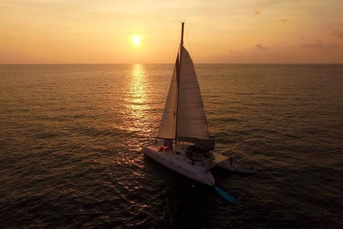 Phuket: Aeolos Catamaran Tour to Coral & Racha Islands + Lunch - Racha Yai: clear water and a busier beach