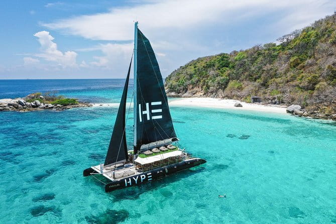 Phuket: Aeolos Catamaran Tour to Coral & Racha Islands + Lunch - The ride past Promthep Cape and sunset fishing