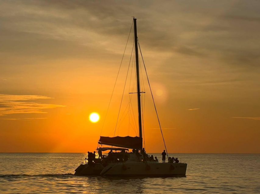 Phuket: Coral Island & Sunset Dinner by Sailing Catamaran - Three hours planned for Coral Island