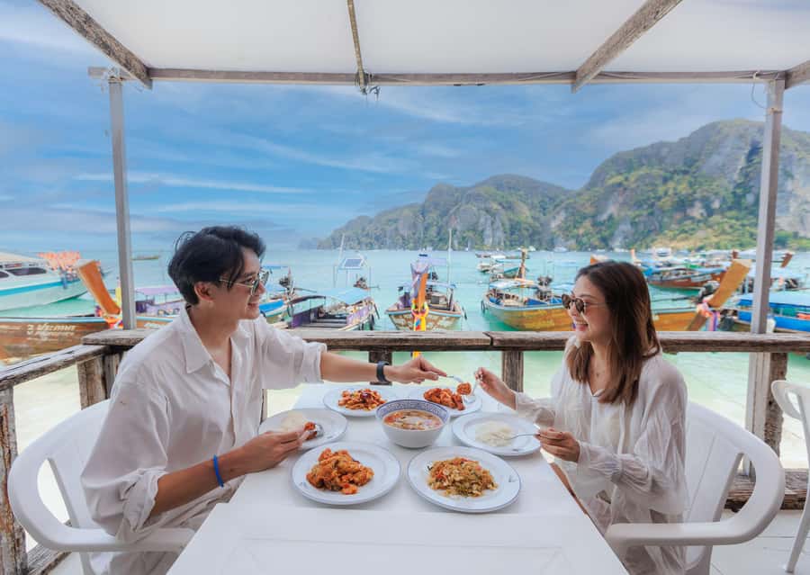 Phuket: Phi Phi Maiton Island Sunset Premium Catamaran Tour - Pileh Lagoon, where the water does the talking
