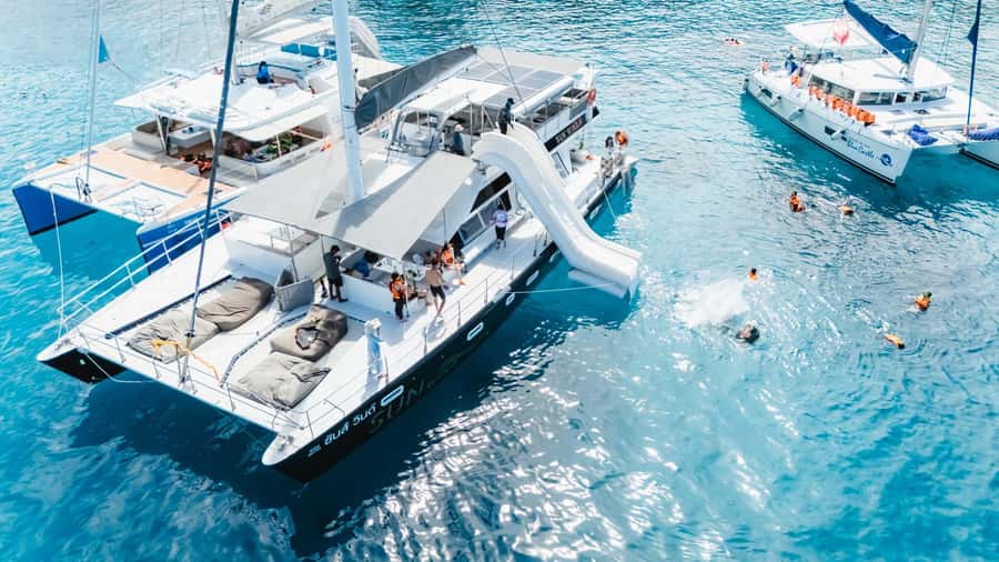Phuket: Racha and Coral Island Catamaran snorkeling Trip - Lunch, tea, and time to enjoy the boat