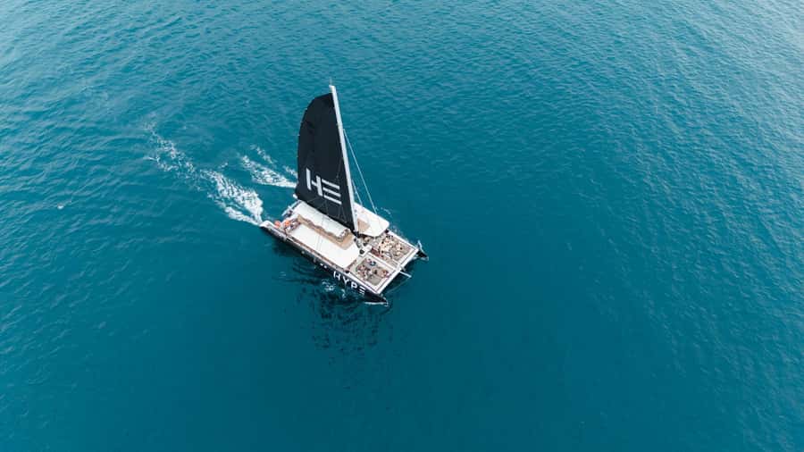 Phuket: Racha and Coral Island Sunset Catamaran Party Tour - Fishing, kayaking, and other included activities