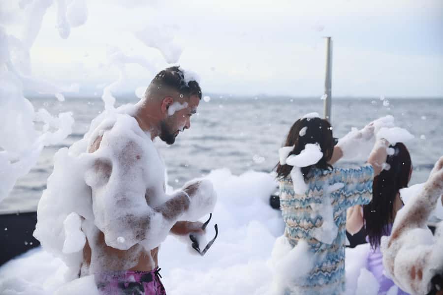 Phuket: Racha & Coral Island Catamaran Tour With Foam Party - Food, photography, and crew service add real value