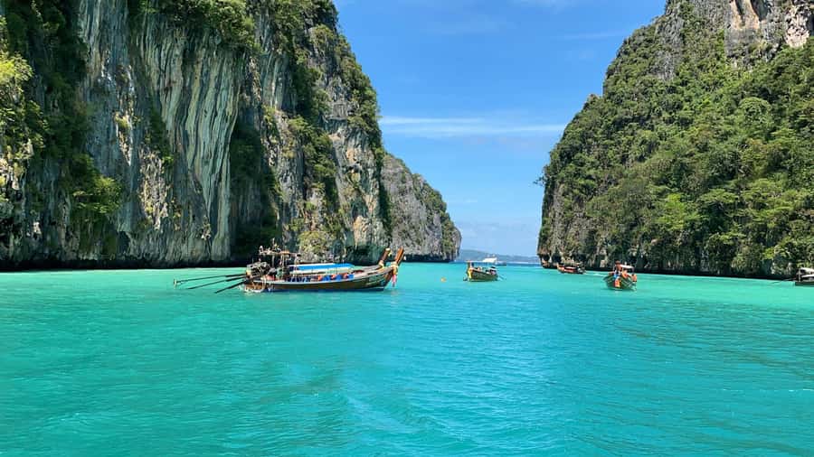Phuket: Ultimate Phi Phi & Maya Bay Speed Catamaran Tour - Viking Cave from the water