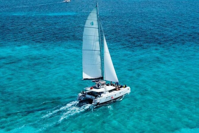 Plus Full Day Catamaran Tour to Isla Mujeres All Inclusive - Arriving at Punta Sur and Isla Mujeres