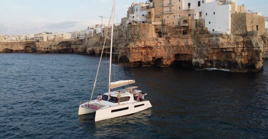Polignano a Mare: Catamaran Tour with Aperitif & Local Food - Cala Corvino is the main event