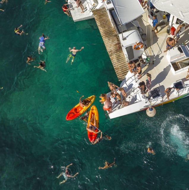 Port d'Alcudia: North Coast Catamaran Cruise with Meal - Three coves, clear water, and shared equipment