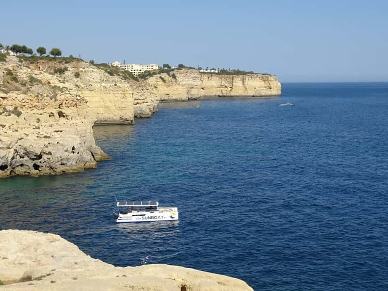 Portimão: Benagil Caves & Golden Coast Eco Catamaran Tour - Entering Benagil Sea Cave