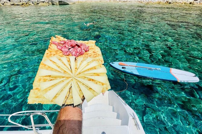 Porto Conte: Half-day catamaran tour with aperitif - Swimming at Cala Dragunara
