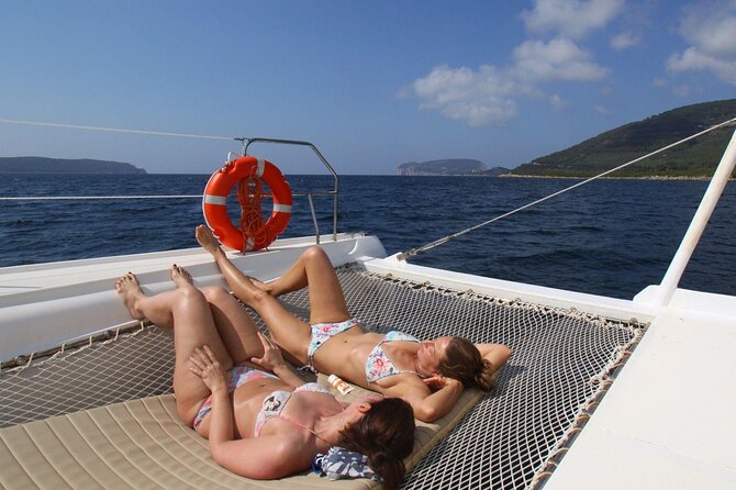 Porto Conte: Half-day catamaran tour with aperitif - The Sardinian aperitif on board