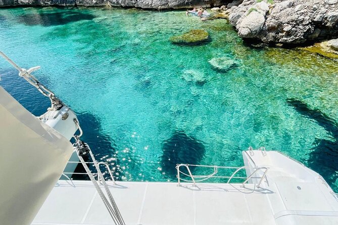 Porto Conte: Half-day catamaran tour with aperitif - Comfort, equipment, and group size