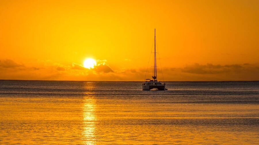 Porto Conte: Sunset catamaran excursion with aperitif - A gentle evening on Porto Conte