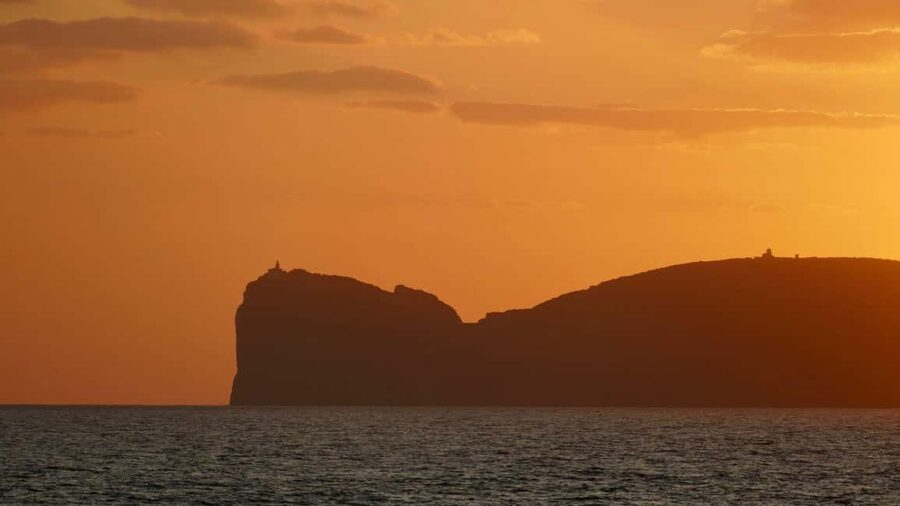 Porto Conte: Sunset catamaran excursion with aperitif - Cala Bramassa and the sunset swim