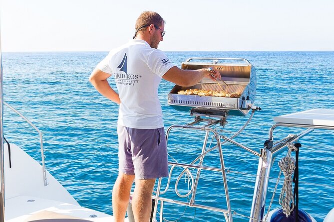 Premium Small-Group Catamaran Cruise with BBQ, Open Bar, Transfer - The final cove, swimming, and the BBQ meal