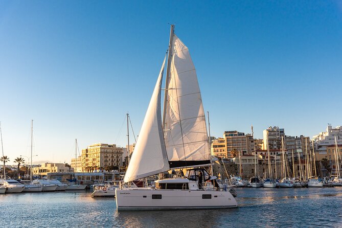 Private 5h Cruise Catamaran Santorini BBQ ,drinks, transfer - Passing White Beach beneath the cliffs