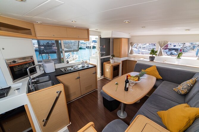 Private 5h Cruise Catamaran Santorini BBQ ,drinks, transfer - Black Mountain, lighthouse, and the caldera