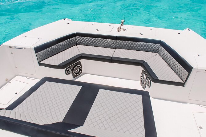 Private Atomic Catamaran Tour to Isla Mujeres - Service, safety, and participation