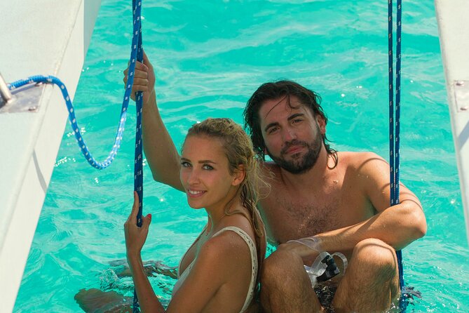 Private Catamaran Adventure Cruise with Rope Swing and Water Slide - Snorkeling around the Antilla wreck