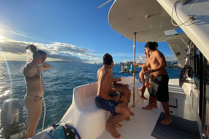 Private Catamaran Cruise and Snorkeling Tour in Honolulu - Music, coolers, and the relaxed onboard setup