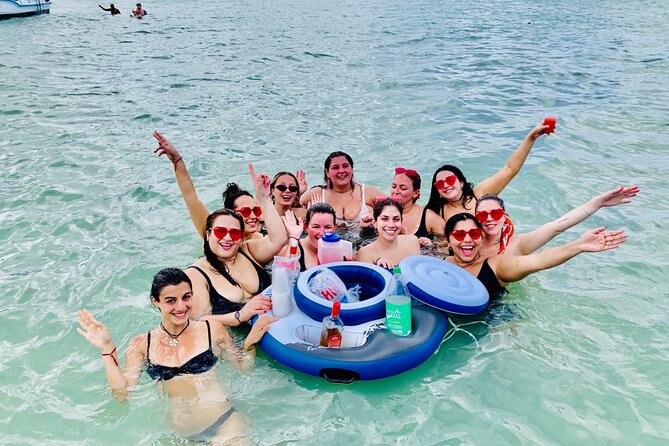 Private Catamaran Cruise with Slide & unlimited drinks - Music, crew energy, and personal service