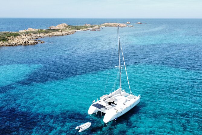 Private catamaran sailing trip around La Caletta -Berchida - Sardinia - Berchida is the route’s big beach finish