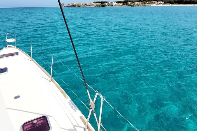 Private catamaran sailing trip around La Caletta -Berchida - Sardinia - What you should bring and what is not promised