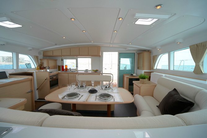 Private Catamaran Tour: Lisbon coast cruise with barbecue and drinks - Deck time before the swim