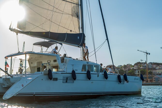 Private Catamaran Tour: Lisbon coast cruise with barbecue and drinks - West past Algés, Caxias, and Oeiras
