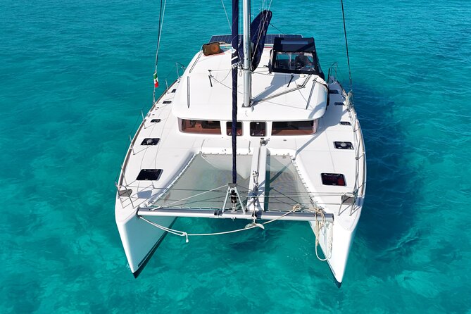 Private Catamaran Tour Super to Isla Mujeres - Drinks, music, and the mood on board