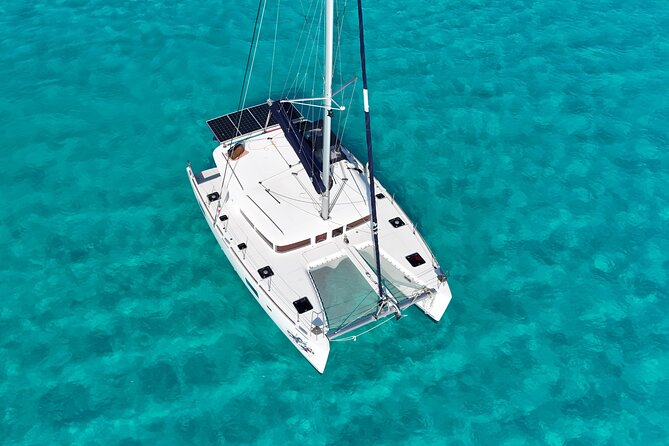Private Catamaran Tour Super to Isla Mujeres - Booking, weather, and cancellation details